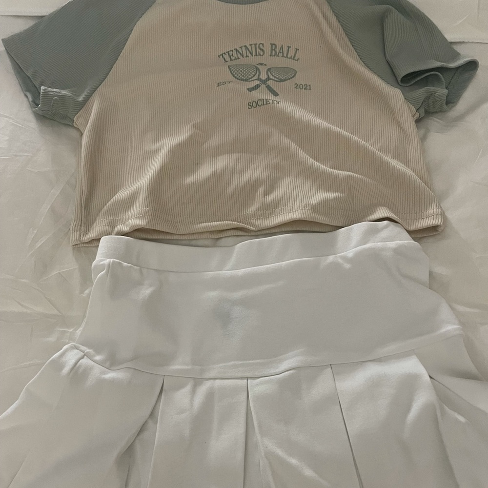 Tennis set green title and sleeves white skirt